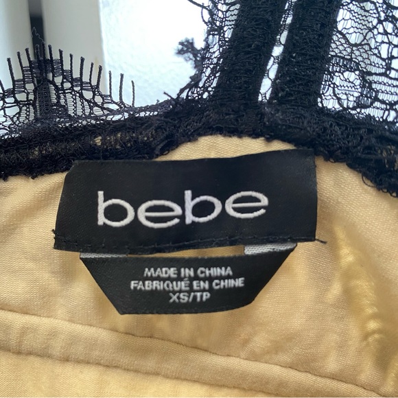 Bebe - Lacey, sleeveless, short black dress - Picture 6 of 7